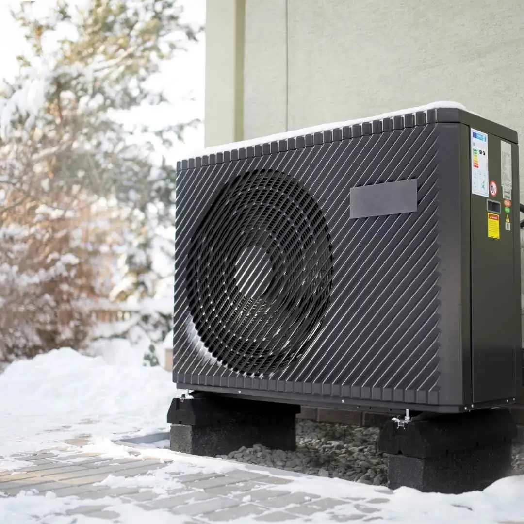 A photo of HVAC system running during winter season with snow-covered background and indoor comfort settings.